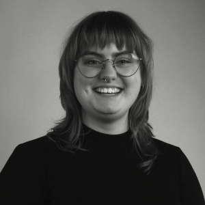 A black and white headshot of Grace Berrill.