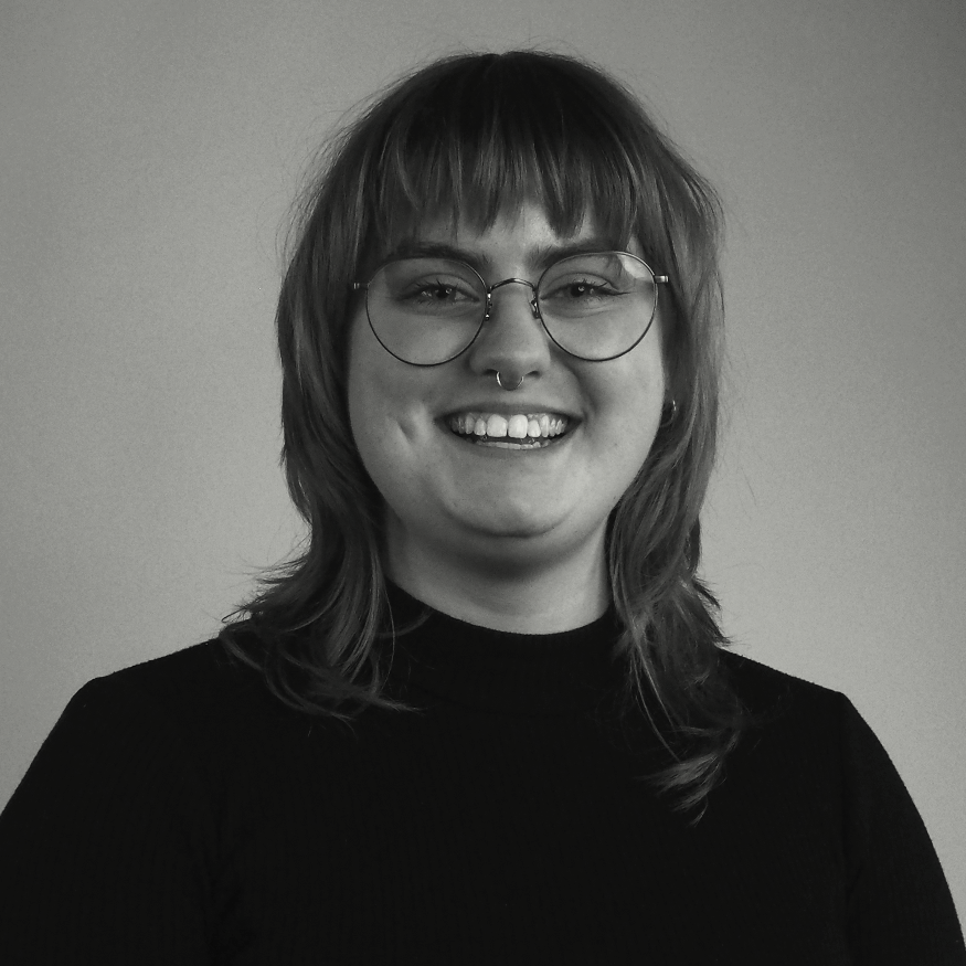A black and white headshot of Grace Berrill.